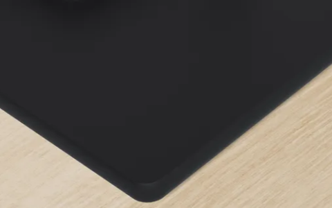 Black glass surface.